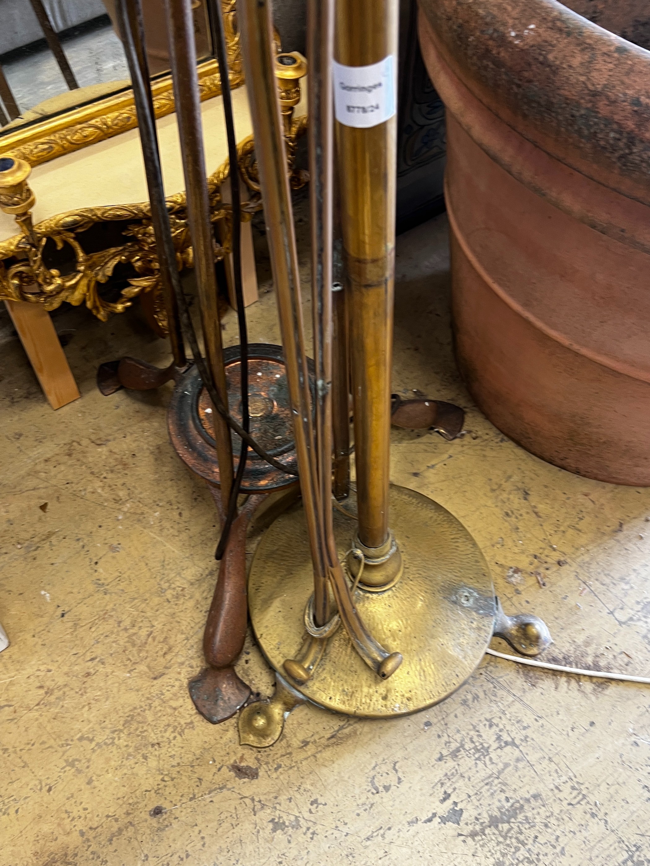 Two Art Nouveau copper and brass standard lamps